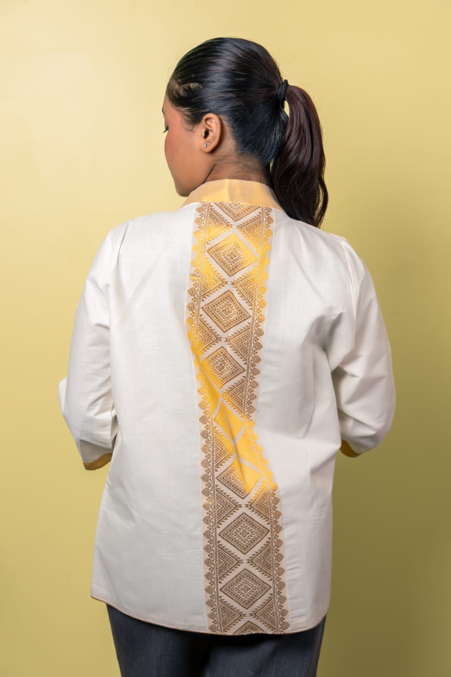 White Shrug with Assamese traditional motifs.